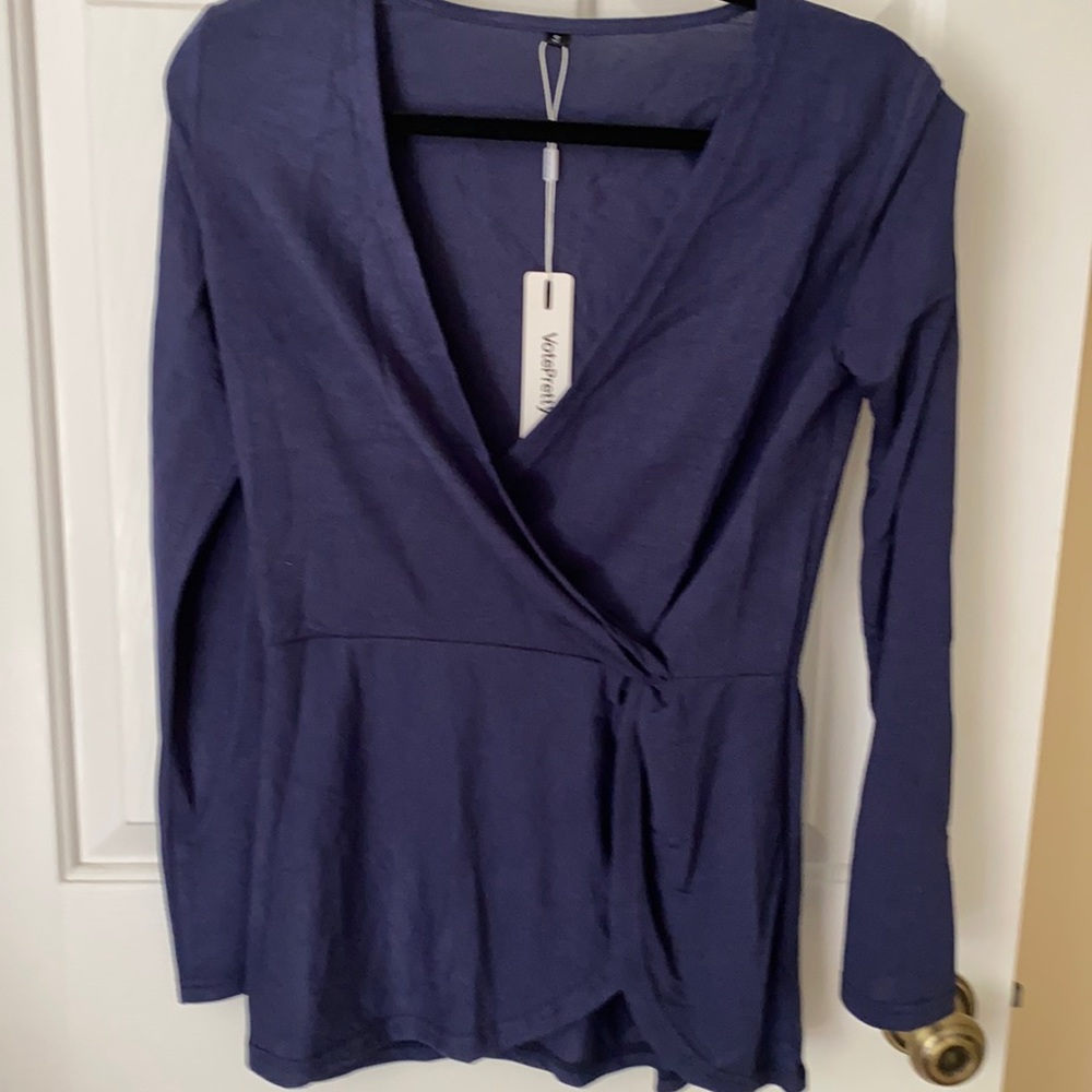 Navy woman’s blouse, size small.